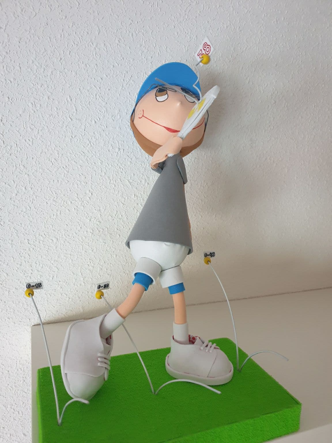 M.